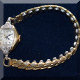 J20. Bulova gold and diamond watch. 